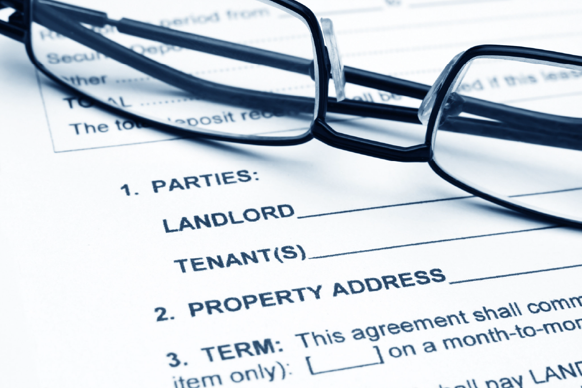 Glasses on top of tenancy agreement new