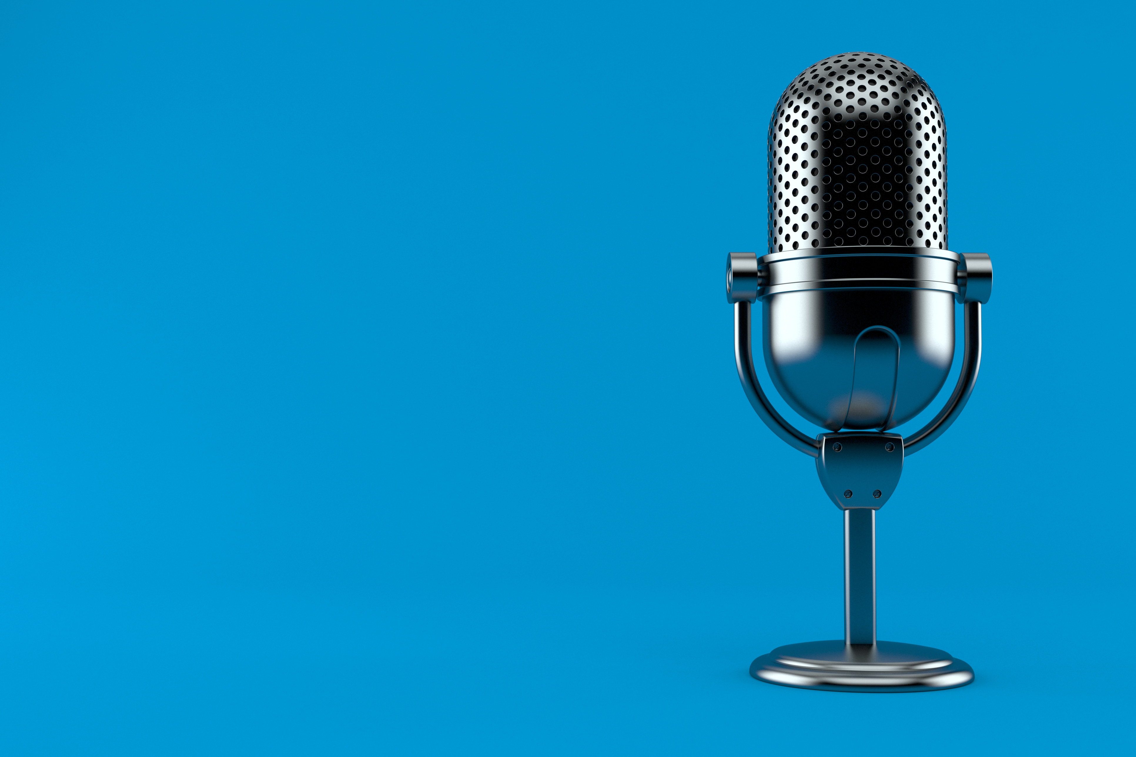 Chrome microphone on blue background