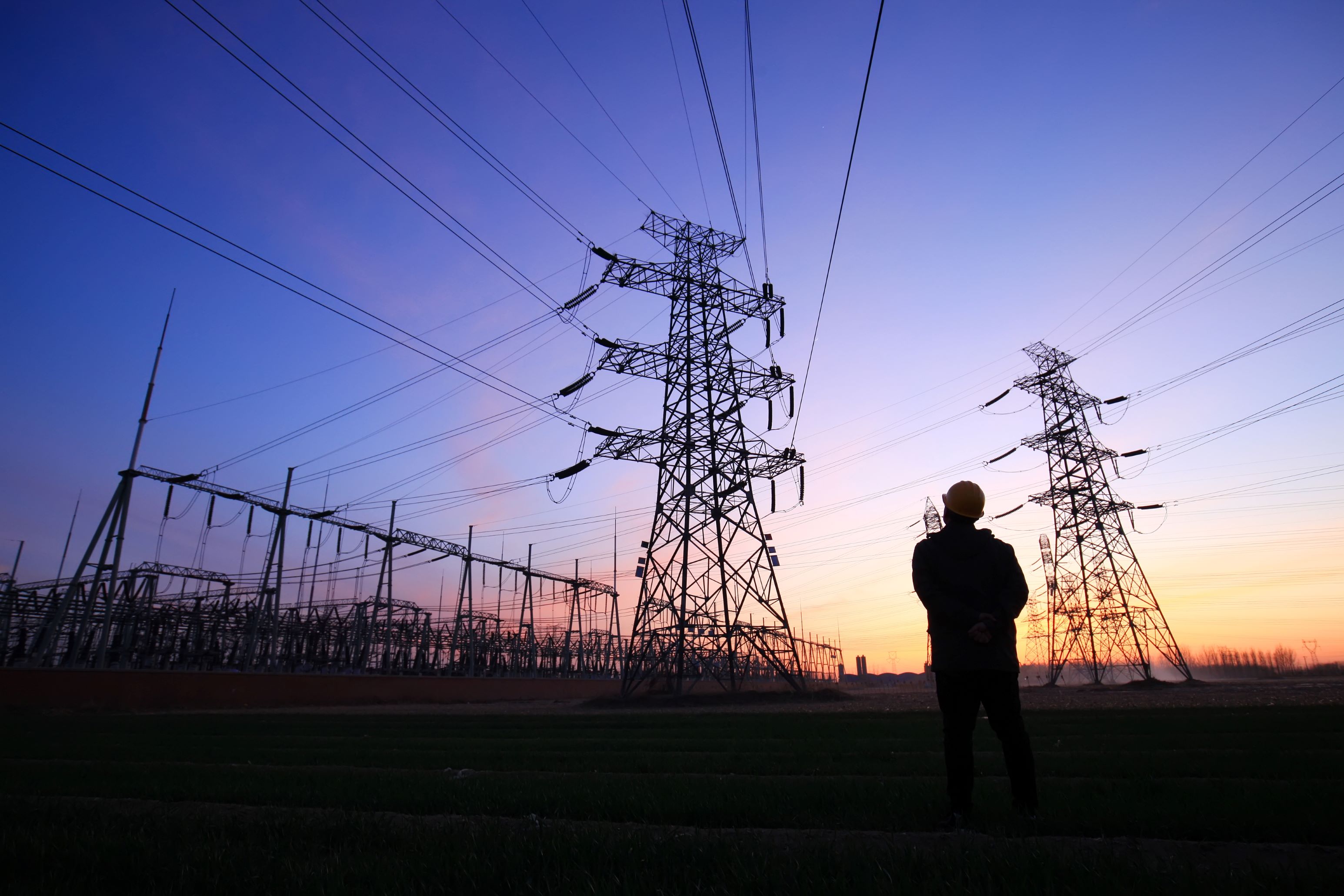 Pylons and surveyor sunset