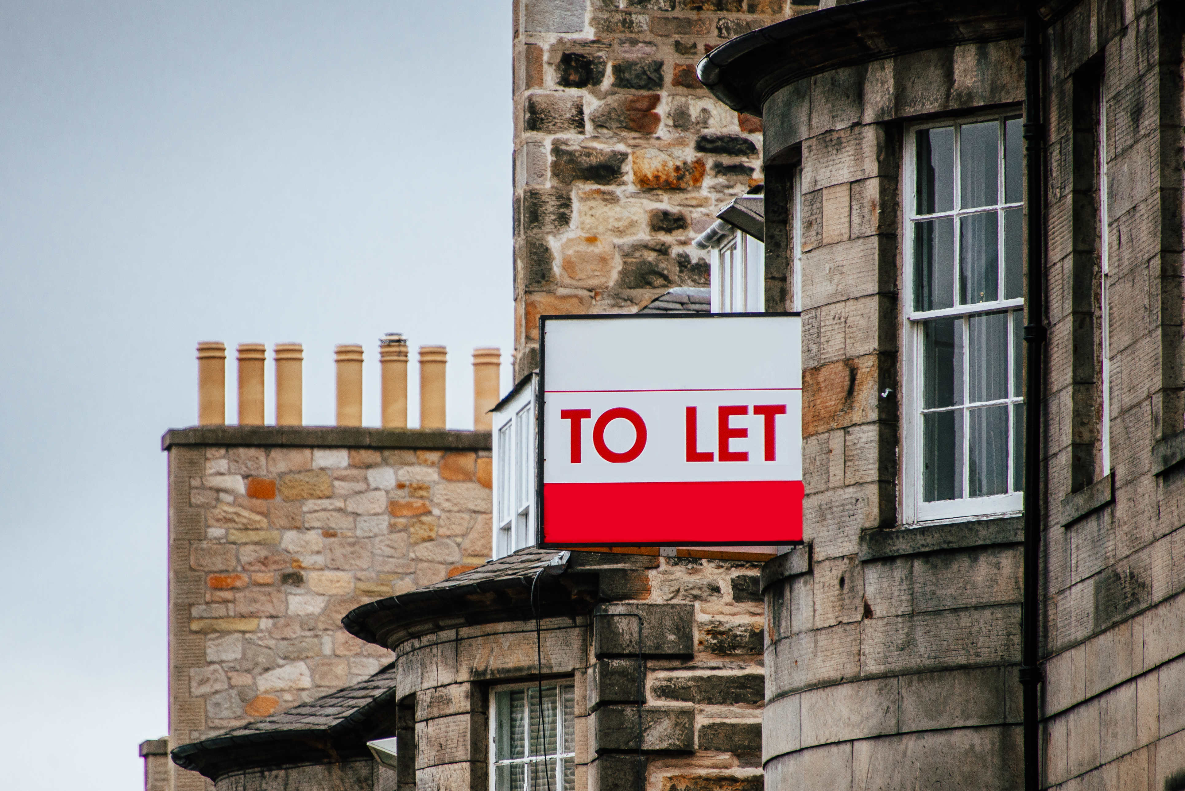 To Let sign on side of building